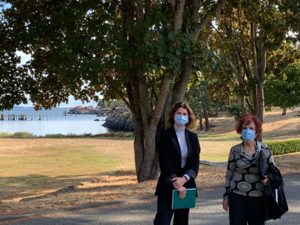 A photo of Senator Jaffer and her assistant Madison standing outside at William Head Institution near Victoria, British Columbia