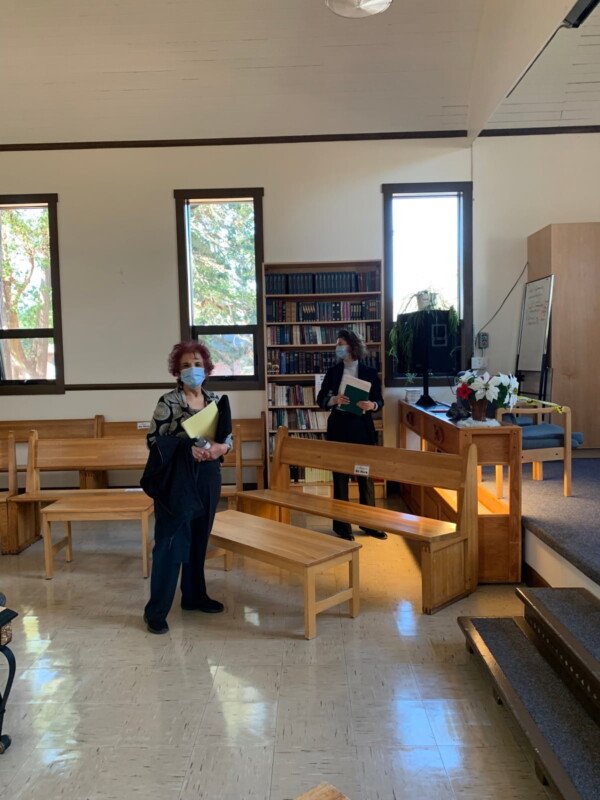 A photo of Senator Jaffer and her assistant Madison standing inside the chapel at William Head Institution near Victoria, British Columbia